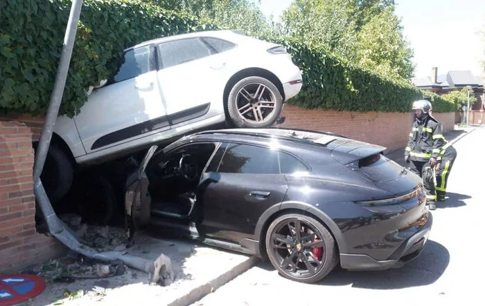Don't Insert Sexist Bad Drivers Joke Here... Taycan Crashes Into (and Under) Parked Macan
