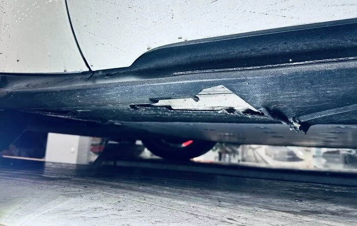 Bottomed out in parking lots - damaged side skirts and jack stand bracket (repair info inside)
