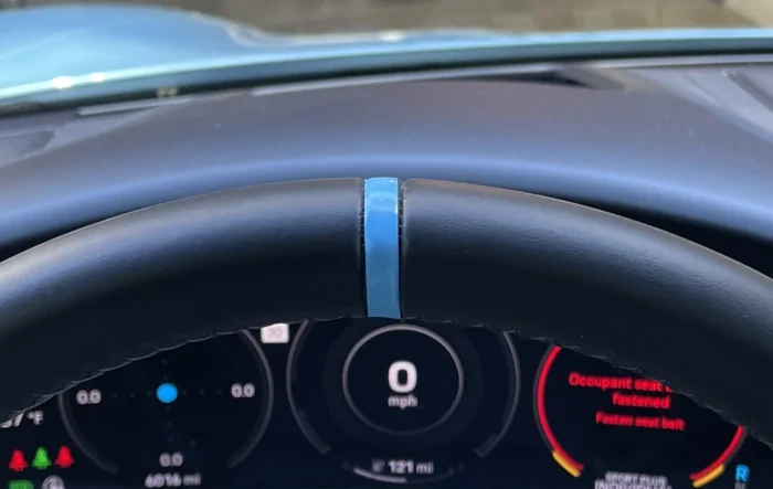 This is the best value mod (relative to price!) -- Steering wheel tab color vinyl