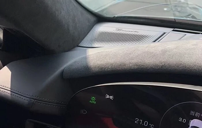 Upgraded annoying plastic instrument cluster cover to alcantara, if you optioned HUD
